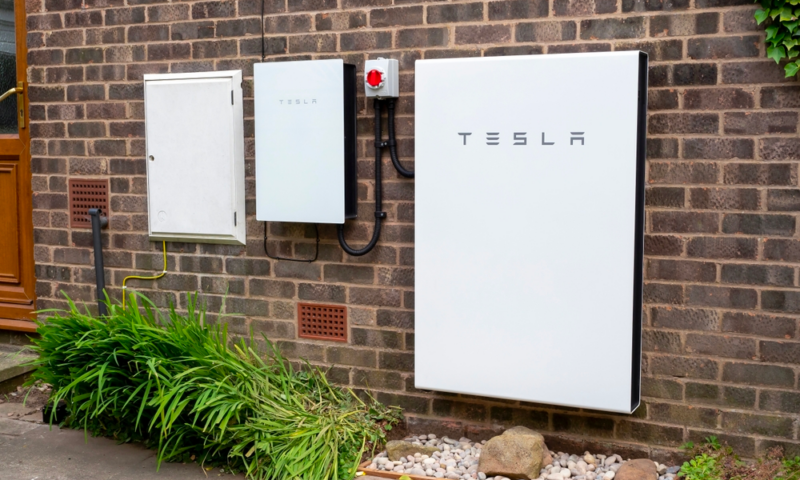 Tesla Powerwall installed on a brick wall, demonstrating efficient energy storage solutions provided by Sea Bright Solar. Tesla Powerwall installed on a brick wall, demonstrating efficient energy storage solutions provided by Sea Bright Solar.