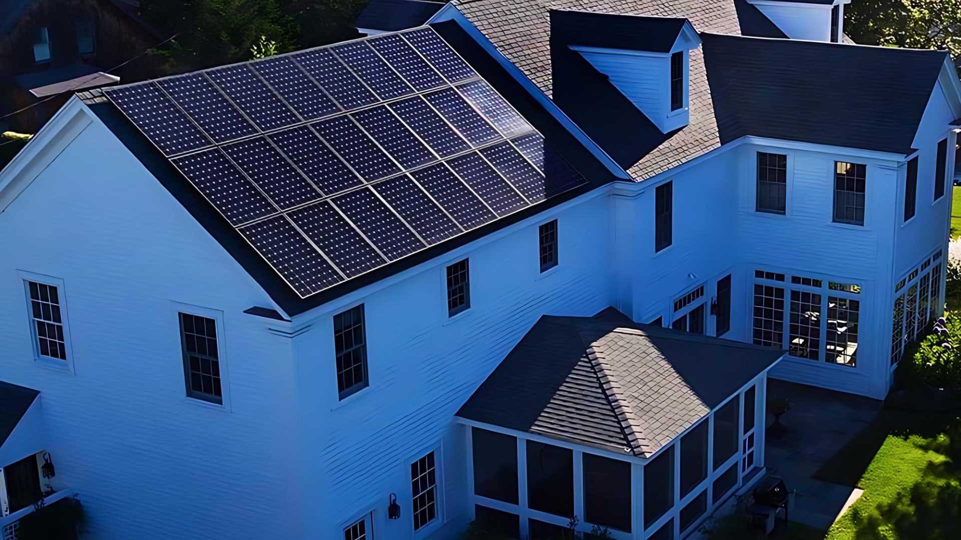 Residential solar panel installation by Sea Bright Solar on a white house