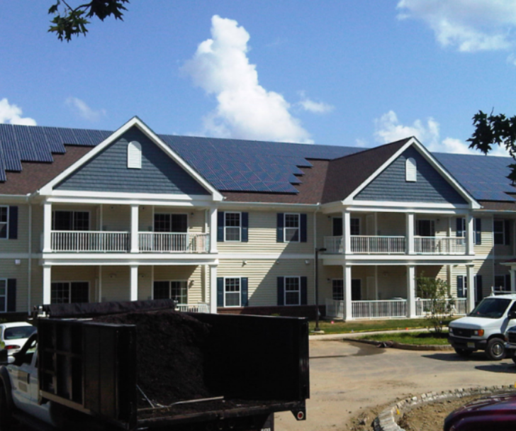 Municipality a building with solar panels on it