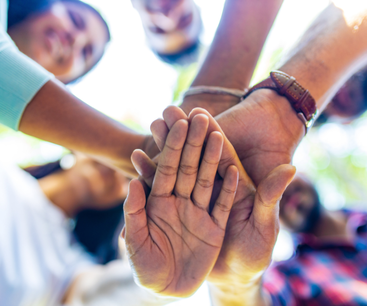 Non Profit (2) a close-up of hands stacked on top of each other