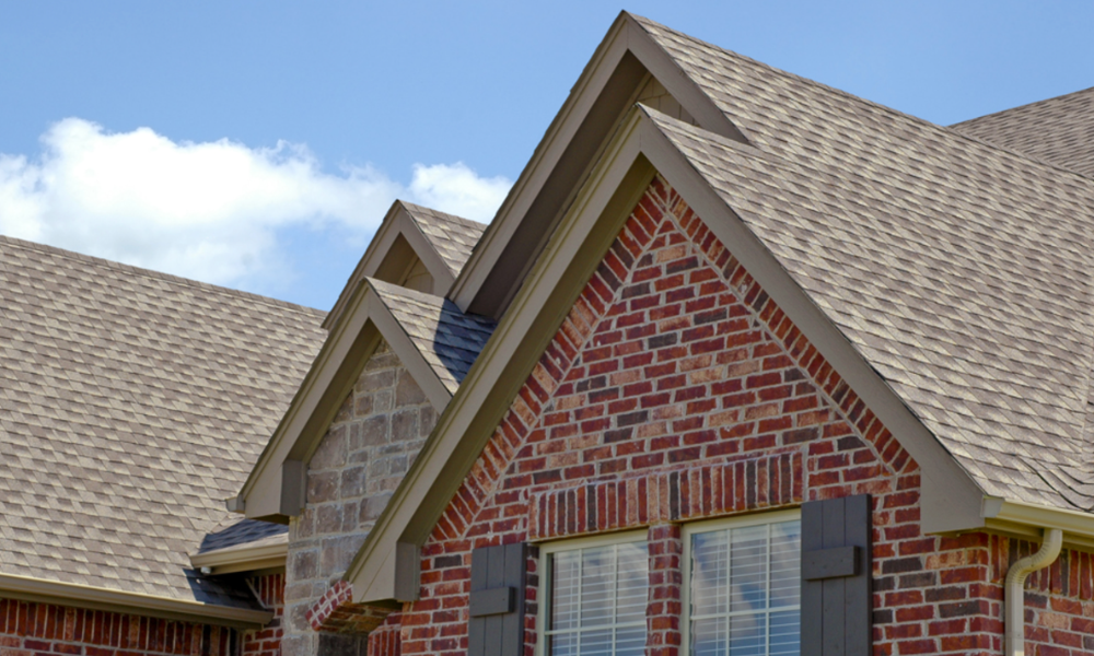 New GAF Timberline HDZ shingle roof replacement on brick home by All Seasons Roofing